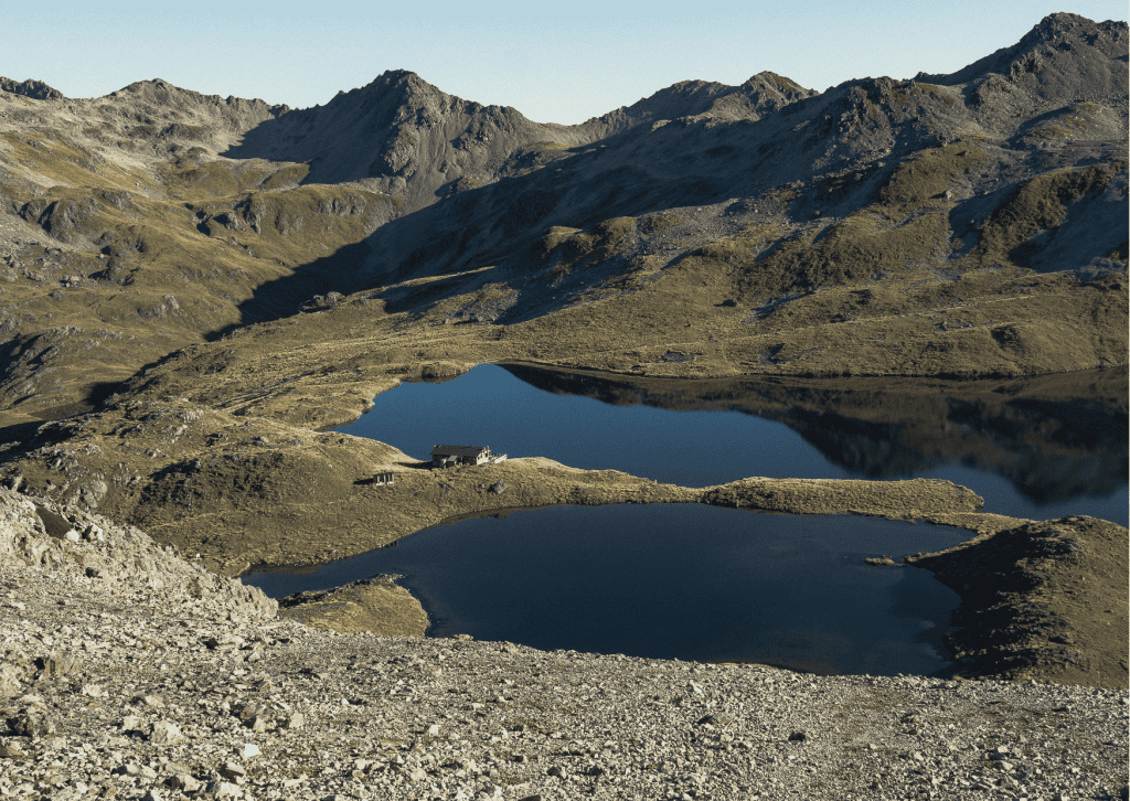 Angelus Hut beside its alpine tarn in Nelson Lakes