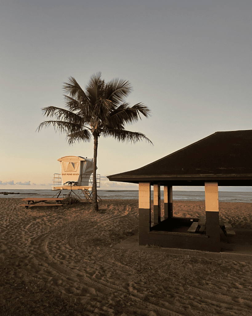 Sunset colors over Salt Pond Beach Park, Kauai