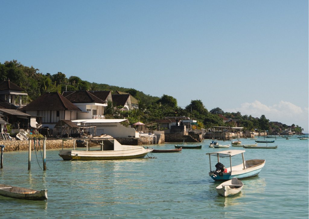 Boats anchored in the harbor of Nusa Lembongan island after the ferry crossing from Bali
