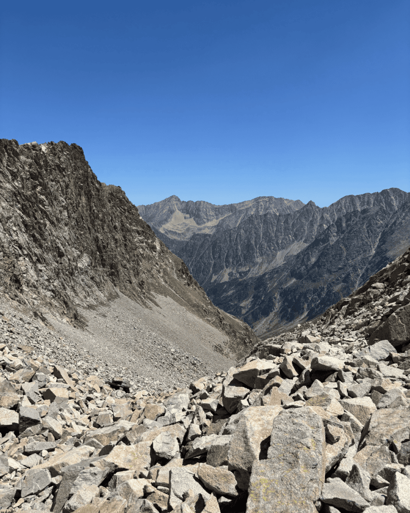 Steep boulder field leading up to the rocky Col d'Arraillé pass