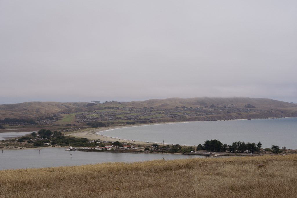 Fog hanging over the Russian River estuary where it meets the ocean at Jenner