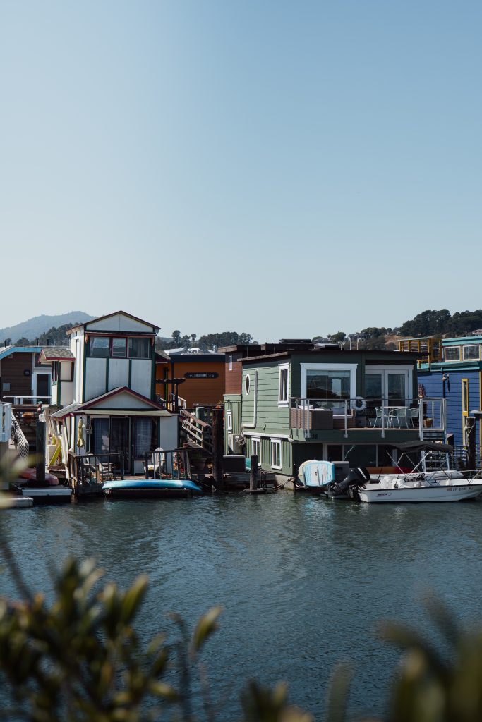 Colourful houseboats and moored boats in the Sausalito harbour