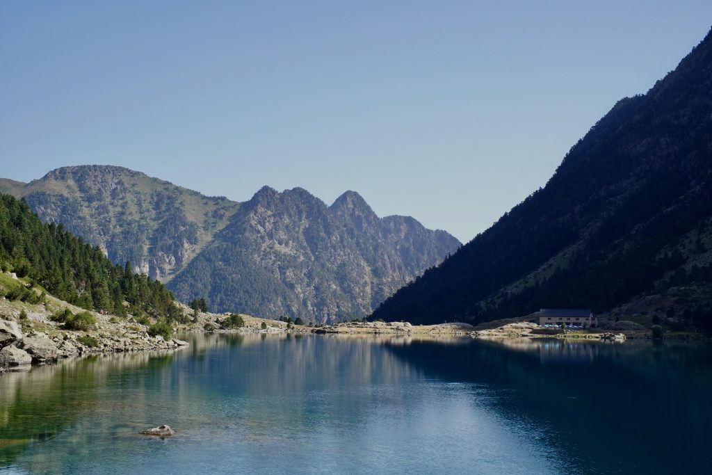 Lac de Gaube with the Vignemale peak rising behind the calm blue-green water